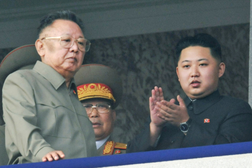 North Korean leader Kim Jong-il and his son Jong-un attend a ceremony marking the 65th founding anniversary of the Workers’ Party in
Pyongyang on Oct. 10. Experts say that the shaky succession process is most accountable for the country’s military adventurism.
(Yonhap News)