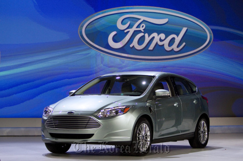 Ford Motor Co.’s Focus Electric car is displayed during a media preview at the 2011 International Consumer Electronics Show in Las Vegas on Thursday.  Bloomberg