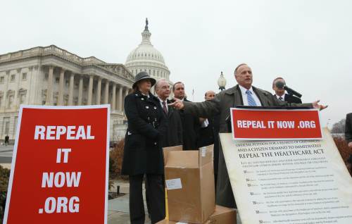 <YONHAP PHOTO-0377> WASHINGTON, DC - JANUARY 18 - Rep. Steve King (R-IA) speaks at a news conference where Republican members of the House displayed petitions Americans have signed demanding the repeal of healthcare legislation January 18, 2011 in Washington, DC. Republicans begin their efforts to repeal the Obama administration's healthcare legislation this week. Win McNamee/Getty Images/AFP== FOR NEWSPAPERS, INTERNET, TELCOS & TELEVISION USE ONLY == /2011-01-19 08:12:26/ <저작권자 ⓒ 1980-2011 ㈜연합뉴스. 무단 전재 재배포 금지.>
Rep. Steve King speaks at a news conference where Republican members of the House displayed petitions Americans have signed demanding the repeal of health care legislation in Washington, DC.
AFP-Yonhap News