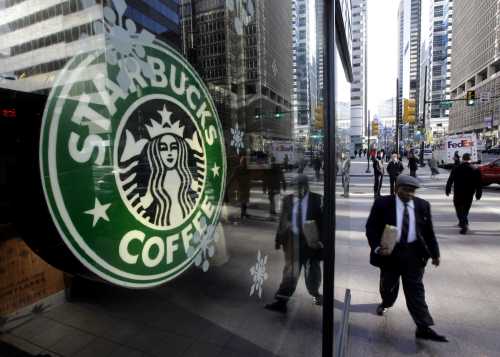<YONHAP PHOTO-2113> In this photo take Dec. 3, 2010, a Starbucks logo is displayed at a store in Philadelphia. Starbucks Corp. said Wednesday, Jan. 19, 2011, that customers with certain BlackBerry smartphones, iPhones and iPod touch can now use those devices to make purchases at all of its U.S. company-run stores.(AP Photo/Matt Rourke) /2011-01-19 21:52:57/ <저작권자 ⓒ 1980-2011 ㈜연합뉴스. 무단 전재 재배포 금지.>
A Starbucks logo is displayed at a store in Philadelphia.  AP-Yonhap News