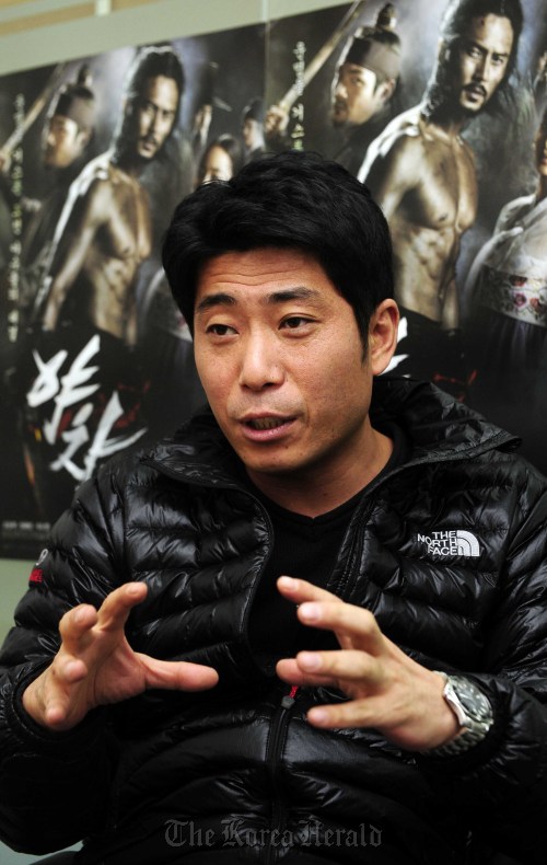 “Yaksa” director Kim Hong-sun discusses why he cut out certain sex scenes and how he worried over how to get the blood to look pretty in an interview with The Korea Herald.  Park Hae-mook/The Korea Herald