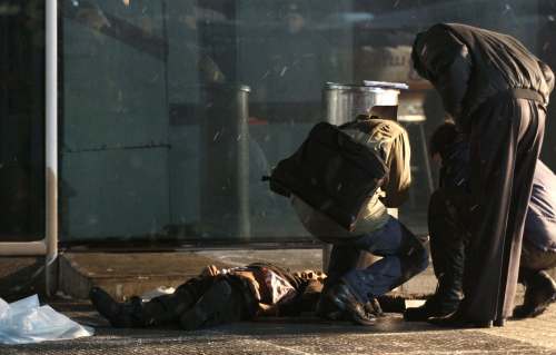 <YONHAP PHOTO-0577> Investigators work near the lifeless body of a man killed in an explosion at Domodedovo airport in Moscow, Monday, Jan. 24, 2011. An explosion ripped through the arrivals hall at Moscow's busiest airport on Monday, killing many people. The Russian president called it a terror attack. (AP Photo/Ivan Sekretarev)/2011-01-25 07:17:27/ <저작권자 ⓒ 1980-2011 ㈜연합뉴스. 무단 전재 재배포 금지.>
Investigators work near the lifeless body of a man killed in an explosion at Domodedovo airport in Moscow on Monday.   AP-Yonhap News
Investigators work near the lifeless body of a man killed in an explosion at Domodedovo airport in Moscow on Monday.   AP-Yonhap News