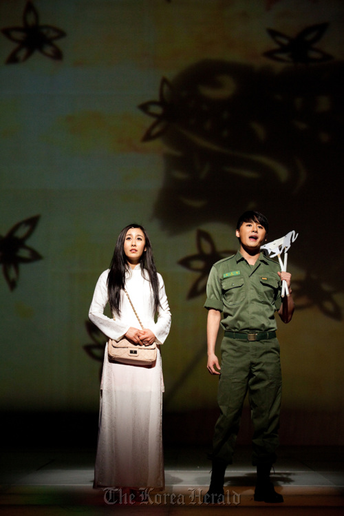 A scene of Joon (Kim Jun-su) and Linh (Yoon Gong-joo) in musical “Tears of Heaven”  Seoul & Company