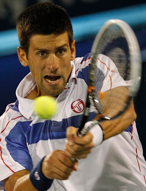 <YONHAP PHOTO-0249> Serbia's Novak Djokovic returns the ball to Spain's Feliciano Lopez during the third day of the Emirates Dubai ATP Tennis Championships in Dubai, United Arab Emirates Wednesday, Feb. 23, 2011.(AP Photo/Nousha Salimi) /2011-02-24 01:08:25/ <저작권자 ⓒ 1980-2011 ㈜연합뉴스. 무단 전재 재배포 금지.>