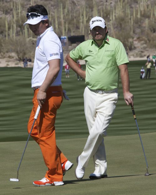 <YONHAP PHOTO-0768> Y.E. Yang of South Korea, left, studies the green before putting as Graeme McDowell of Northern Ireland looks on during a quarterfinal round of the Match Play Championship golf tournament Friday, Feb. 25, 2011, in Marana, Ariz. (AP Photo/Matt York)/2011-02-26 06:04:30/ <저작권자 ⓒ 1980-2011 ㈜연합뉴스. 무단 전재 재배포 금지.>
<YONHAP PHOTO-0768> Y.E. Yang of South Korea, left, studies the green before putting as Graeme McDowell of Northern Ireland looks on during a quarterfinal round of the Match Play Championship golf tournament Friday, Feb. 25, 2011, in Marana, Ariz. (AP Photo/Matt York)/2011-02-26 06:04:30/ <저작권자 ⓒ 1980-2011 ㈜연합뉴스. 무단 전재 재배포 금지.>