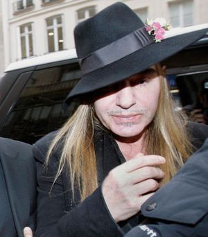 John Galliano arrives at the police station in Paris. (AP)