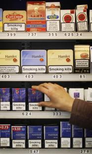 In this June 29, 2010 file photo, tobacco products are displayed in a shop in Glasgow, Scotland. Tobacco will no longer be displayed in shops under new legislation being implemented by Britain's Government in was announced in London, Wednesday May 9, 2011. (AP)