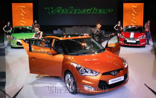 Hyundai Motor Co. launches its new compact passenger vehicle, the Veloster, in Seoul on Thursday.  Hyundai Motor Co.