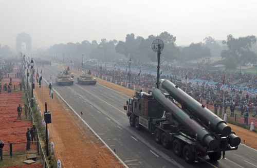 Indian army Brahmos missile launcher passes on a flotilla towards the India Gate memorial during rehearsal for the Republic Day parade in New Delhi, India. In its race to join the club of international powers, India has reached another major milestone, it's now the world's largest weapons importer. (AP-Yonhap News)