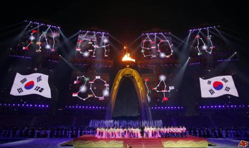 The South Korean flag is projected on giant screens during the closing ceremony of the 16th Asian Games in Guangzhou, China, Saturday, Nov. 27, 2010. The South Korean city of Incheon will host the 2014 edition of the Asian Games. (AP)