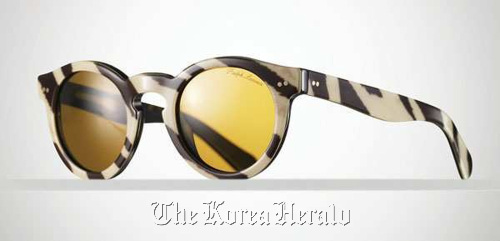 For something a tiny bit over the top but still wearable, zebra-striped round glasses from Ralph Lauren Collection ($250) are sure to turn a few heads.  MCT