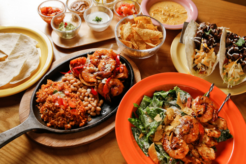 The lunch menu at Mamasita including the galbi soft taco, Mexican Caesar salad and Mexican rice with shrimp. Mamasita