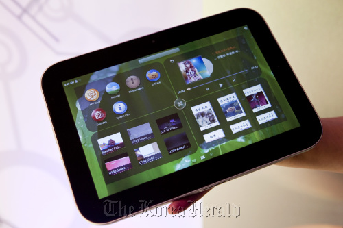 A Lenovo Group Ltd. LePad, a tablet computer is displayed during the 2011 International Consumer Electronics Show in Las Vegas.  Bloomberg
A Lenovo Group Ltd. LePad, a tablet computer is displayed during the 2011 International Consumer Electronics Show in Las Vegas.  Bloomberg