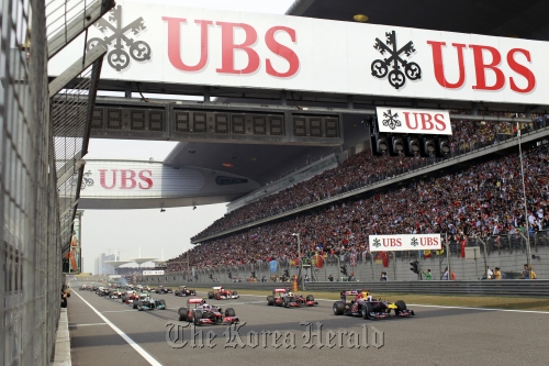 F1 racing cars line up on the grid at the start of the Chinese Grand Prix on April 17.  LAT Photographic