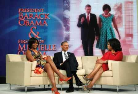 President Barack Obama and first lady Michelle Obama are pictured with Oprah Winfrey during a taping of The Oprah Winfrey Show at Harpo Studios in Chicago, Wednesday.