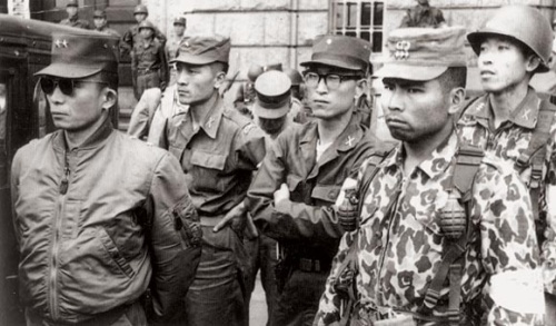 Maj. Gen. Park Chung-hee (left) stands with his lieutenants in front of Seoul City Hall after seizing power in a coup on May 16, 1961. Korea Herald file photo