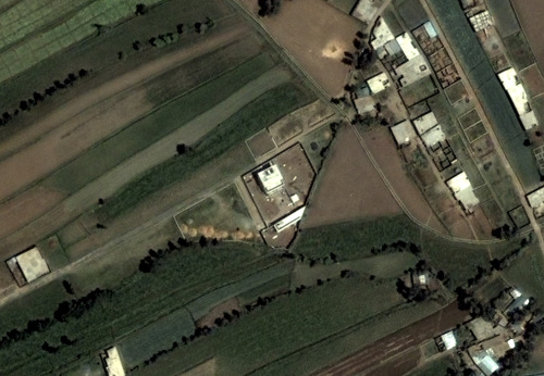 This June 15, 2005 satellite image provided by DigitalGlobe shows the compound, center, in Abbottabad, Pakistan, where Osama bin Laden lived. (AP-Yonhap News)