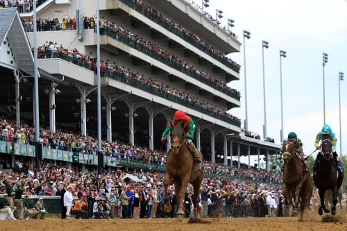 <YONHAP PHOTO-1156> LOUISVILLE, KY - MAY 07: Jockey John Velazquez, riding Animal Kingdom #16 crosses the finish line on way to winning the 137th Kentucky Derby at Churchill Downs on May 7, 2011 in Louisville, Kentucky. Matthew Stockman/Getty Images/AFP== FOR NEWSPAPERS, INTERNET, TELCOS & TELEVISION USE ONLY == /2011-05-08 09:27:04/ <저작권자 ⓒ 1980-2011 ㈜연합뉴스. 무단 전재 재배포 금지.>
Animal Kingdom crosses the finish line to win the 137th Kentucky Derby.  AFP-Yonhap News