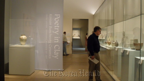 A visitor looks at the “Poetry in Clay: Korean Buncheong Ceramics” exhibition at the Metropolitan Museum of Art in New York on April 27. Kim Yoon-mi/The Korea Herald