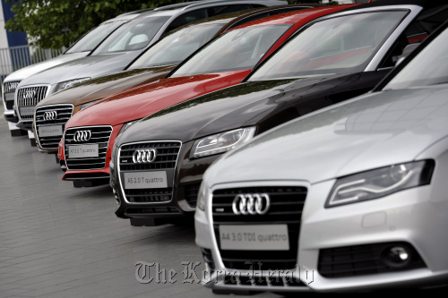 A line of Audi AG automobiles on display during the company’s annual general meeting in Neckarsulm, Germany.  Bloomberg