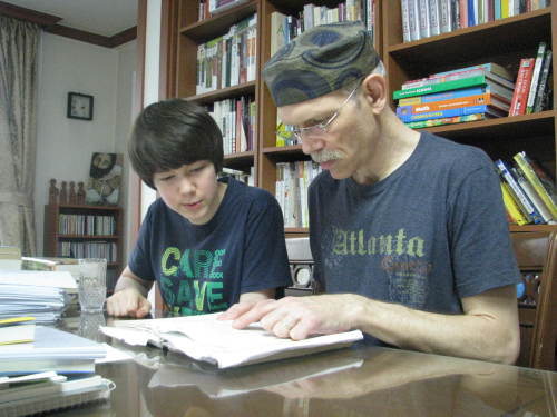 Horace Jeffery Hodges tutors his daughter, Sa-Rah Ahyoga Hwang, on John Milton’s “Paradise Lost” at their home in Seoul. Rob York