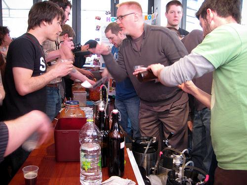 Participants talk over some homebrewed beer at the first Fermentation Celebration at Craftworks Taphouse and Bistro in Itaewon. Jason Lindley