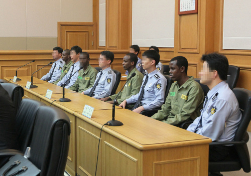 Somali pirates on trial last month after hijacking a South
Korean freighter earlier in the year. Prosecutors unsuccessfully
sought the death penalty for one pirate for the attempted murder
of the ship’s captain. (Yonhap News)