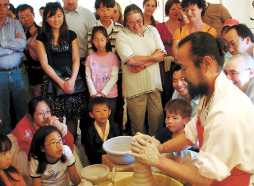 Participants take part in a traditional tea ceremony during the 2007 Korea festival in Lausanne, Switzerland.