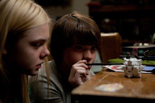 Elle Fanning, left, plays Alice Dainard and Joel Courtney plays Joe Lamb in “Super 8,” from Paramount Pictures. (Francois Duhamel/Courtesy Paramount Pictures/MCT)