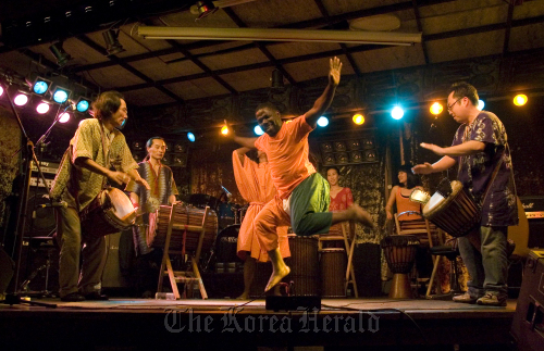 Korea’s African percussion group KUMBAYA performs with African dancers. African Cultural Festival