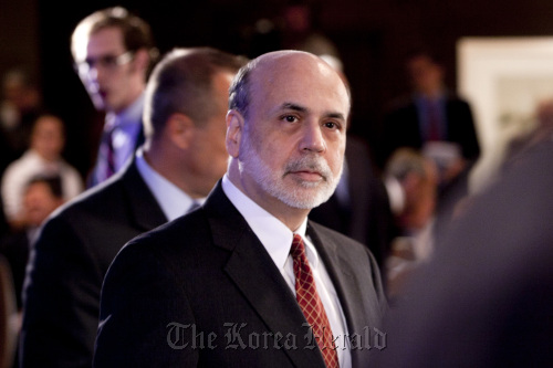 Ben S. Bernanke, chairman of the U.S. Federal Reserve, arrives to speak at the Committee For a Responsible Federal Budget annual conference in Washington, D.C. on Tuesday. Bloomberg