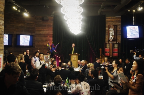 A charity auction at the Korean Culture Center in London in October 2010.  KCC