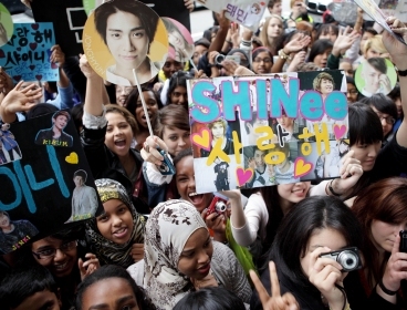 SHINee fans wait for the South Korean boy band on Abbey Road in London, Sunday.