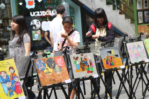 Autism exhibition
People look at winning pictures from the Europe-Korea Foundation’s Autistic Children’s Drawing Contest in Seoul.   EFK