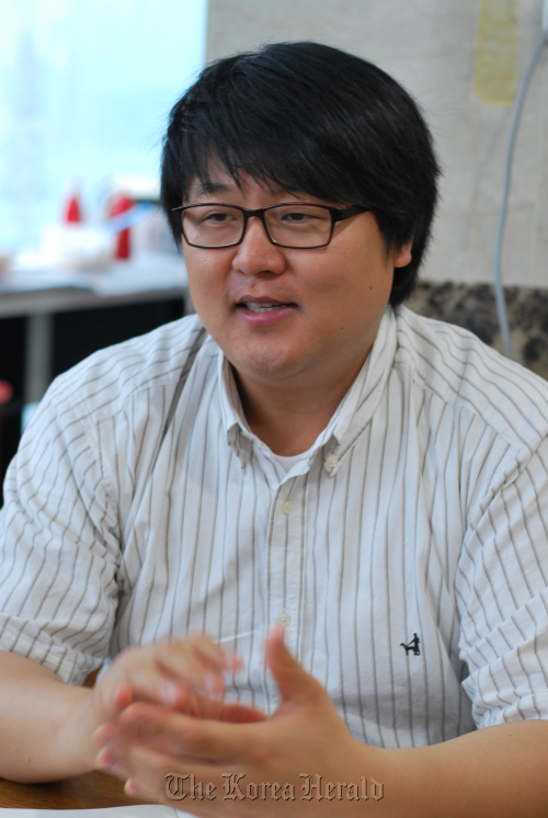 Markers worship leader Shim Jong-ho speaks during an interview in Seoul on Thursday. Markers