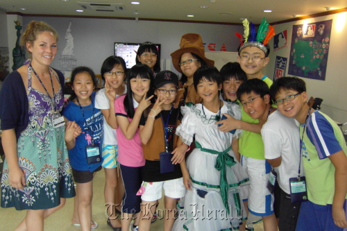 Students and a native English speaking instructor during a summer vacation camp.