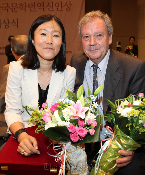 Choi Mi-kyung (left) and Jean-Noel Juttet, the co-Grand-Prix winners of the 10th Korean Literature Translation Awards, after receiving the prize at the Korea Press Center in central Seoul, Thursday.
Yonhap News.
Choi Mi-kyung (left) and Jean-Noel Juttet, the co-Grand-Prix winners of the 10th Korean Literature Translation Awards, after receiving the prize at the Korea Press Center in central Seoul, Thursday.
Yonhap News