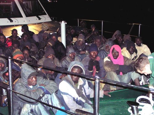 Illegal immigrants from Africa are caught on Isla Fuerteventura, Spain, December 18, 2003. (MCT)