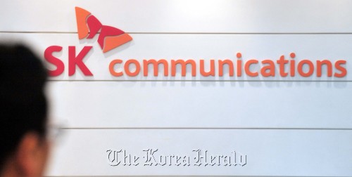 SK커뮤니케이션즈 회사스케치<br />정희조 기자/checho@heraldm.com 110729\r\nThe name and logo of SK Communications at its headquarters in downtown Seoul.   Chung Hee-cho/The Korea Herald