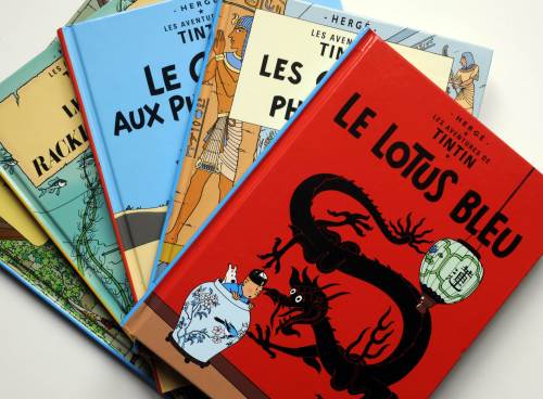 <YONHAP PHOTO-0940> TO GO WITH AFP STORY Entertainment-Iraq-Belgium-book-Tintin,FEATURE BY ANWAR FARUQI (FILES) -- File picture dated October 24, 2010 shows several cartoon books featuring legend reporter Tintin, created by Belgian author Georges Remi aka Herge. The Belgian comic writer had modelled the character of Prince Abdullah of Khemed after Iraq's late King Faisal II, who gained a sentimental popularity in the West as Iraq's "boy king," after he lost his father King Ghazi in a 1939 car crash and inherited the throne aged three. Faisal was latered murdered at the age of 23 in Baghdad following 1958 coup led by Colonel Abdul Karim Qassim. AFP PHOTO / JEAN PIERRE MULLER /2011-08-16 12:34:17/ <저작권자 ⓒ 1980-2011 ㈜연합뉴스. 무단 전재 재배포 금지.>\r\nBooks featuring Tintin, created by Belgian author Georges Remi a.k.a. Herge.  AFP-Yonhap News