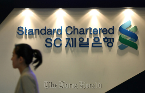 The Standard Chartered First Bank Korea Ltd. logo at the company’s headquarters in Seoul.   Bloomberg