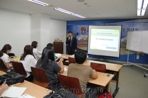 Volunteers participate in a doping control officer training workshop in preparation for the 2011 Daegu World Championships.\r\nVolunteers participate in a doping control officer training workshop in preparation for the 2011 Daegu World Championships.