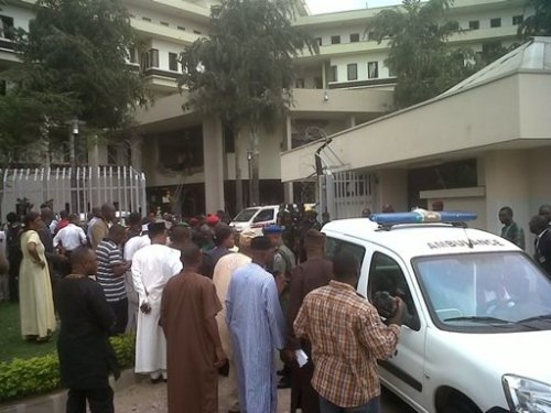 This image released by Saharareporters shows ambulances and rescue workers after a large explosion struck the United Nations' main office, background, in Nigeria's capital Abuja Friday Aug. 26, 2011, flattening one wing of the building and killing several people. A U.N. official in Geneva called it a bomb attack. The building, located in the same neighborhood as the U.S. embassy and other diplomatic posts in Abuja, had a huge hole punched in it. (AP)