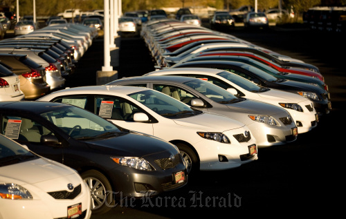 New Toyota Motor Corp. Corolla vehicles sit on the lot at Stevinson Toyota West dealership in Lakewood, Colorado.  Bloomberg