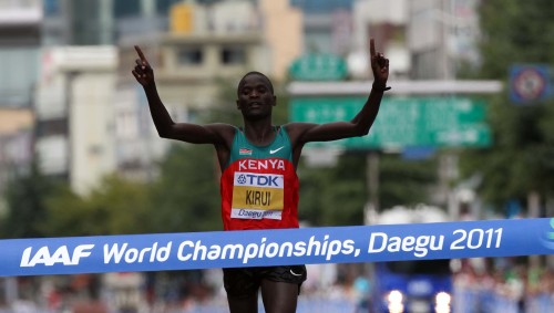 Kenyan Abel Kirui runs through the finish line of the men’s marathon at the 2011 World Championships in Daegu on Sunday. (Park Hae-mook/The Korea Herald)
