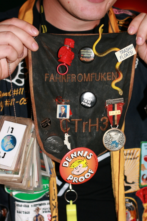 A Hasher shows a bib bearing his nickname at a Korea Hash\r\nNash 2011 social in VFW bar in Haebangcheon, Seoul on Friday.\r\n◄ A woman wearing “Hash” shorts makes her way through “Shiggy”\r\n— the name Hashers give to shrubbery or rocks in their path —\r\non a trail set by the Seoul Hash House Harriers in Ilsan on\r\nSaturday. Kirsty Taylor/The Korea Herald