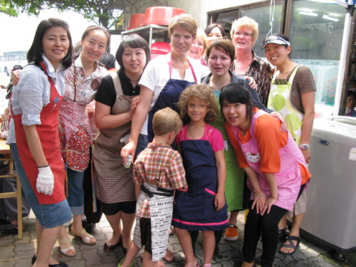 Volunteers at BIWA’s Haeundae soup kitchen. BIWA