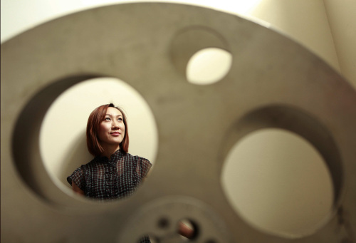 Sally Liu just finished her MFA at Columbia film school and is doing an internship on a film set this summer. In a year or so, she plans to return to her home country, China, where she says there is more opportunity.   (Carolyn Cole/Los Angeles Times/MCT)
