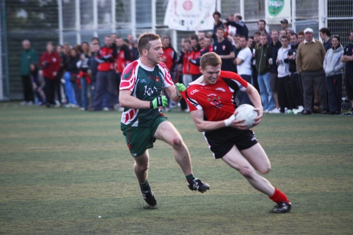 Jason O’Neill of Singapore is fouled by a Hong Kong player in the men’s final of the Asian Gaelic Games.    Jody Fitzpatrick