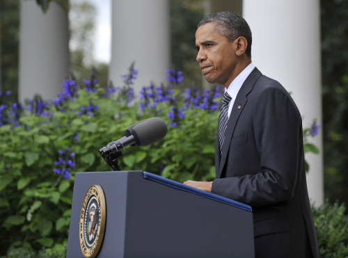 <YONHAP PHOTO-0647> (111020) -- WASHINGTON D.C., Oct. 20, 2011 (Xinhua) -- U.S. President Barack Obama delivers a statement on the reported death of Libya's ousted leader Muammar Gaddafi at the Rose Garden of the White House in Washington D.C., capital of the United States, Oct. 20, 2011. Obama said on Thursday that the reported death of Libya's ousted leader Muammar Gaddafi marks the end of a long and painful chapter for the people of Libya, but there's still a long road to democracy for the country. (Xinhua/Zhang Jun)/2011-10-21 06:25:56/ <저작권자 ⓒ 1980-2011 ㈜연합뉴스. 무단 전재 재배포 금지.>\r\nU.S. President Barack Obama delivers a statement on the reported death of Libya’s ousted leader Moammar Gadhafi at the Rose Garden of the White House in Washington, D.C., Thursday.     Xinhua-Yonhap News
